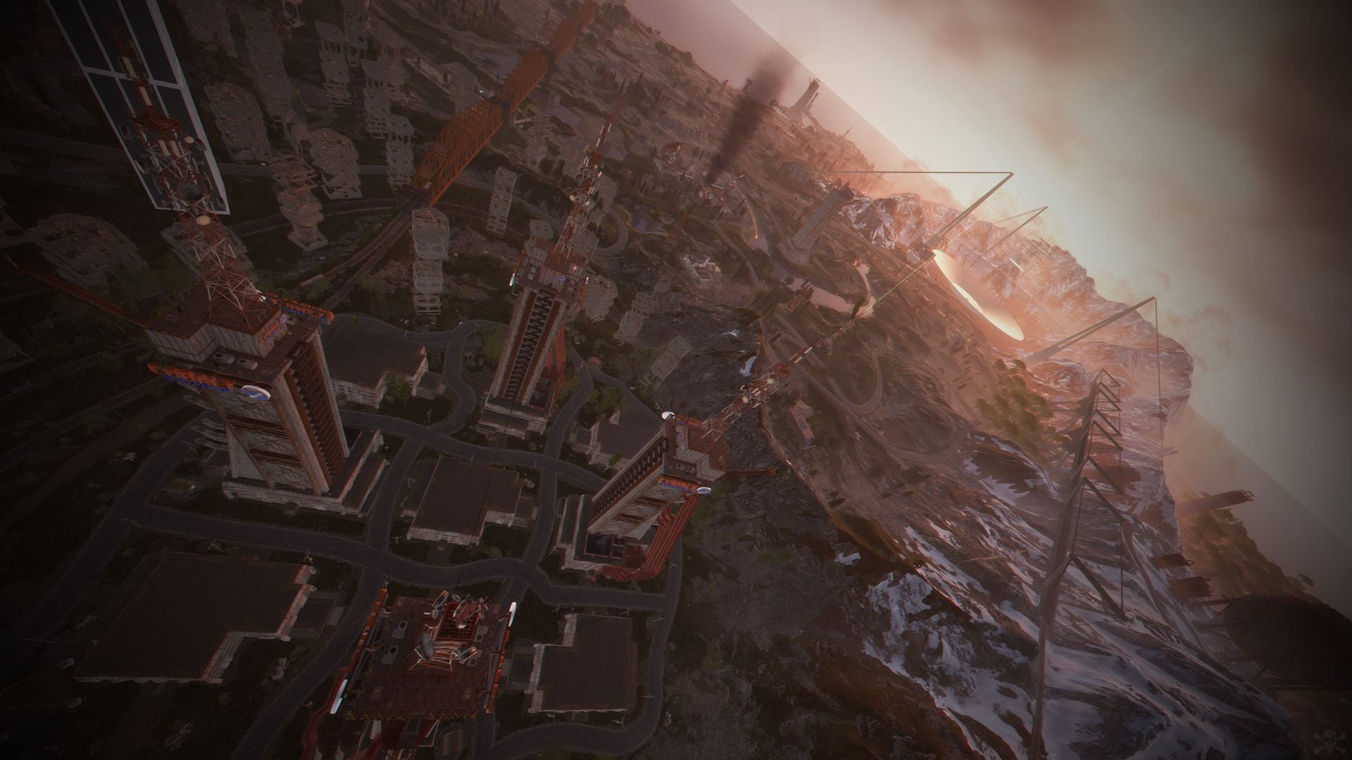 Aerial view of a ruined city of tower blocks and roads beside a rocky ridge, on the custom Rust map Extraction